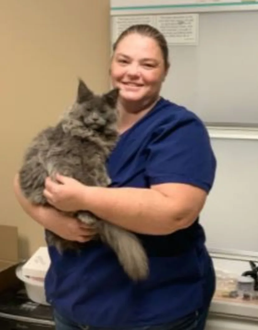 Amanda, CVT inside holding a cat